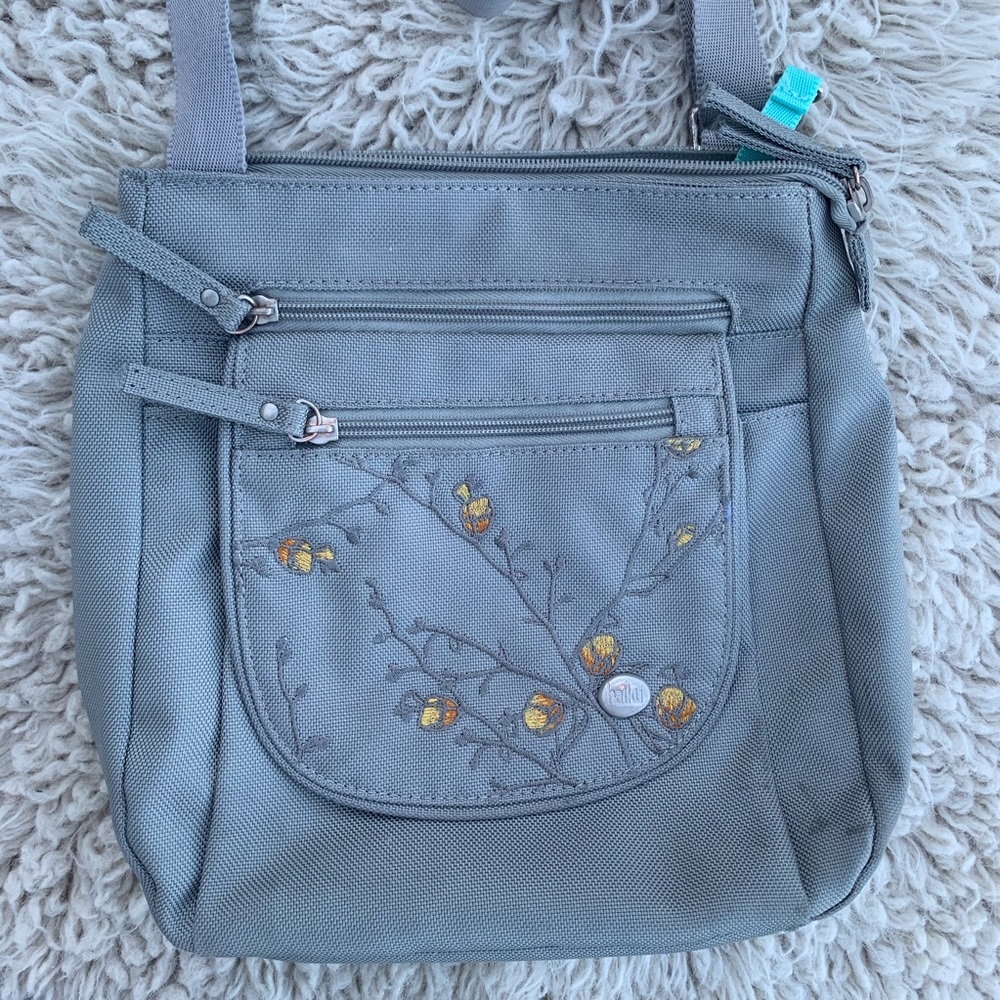 Haiku cross body purse tons of pockets